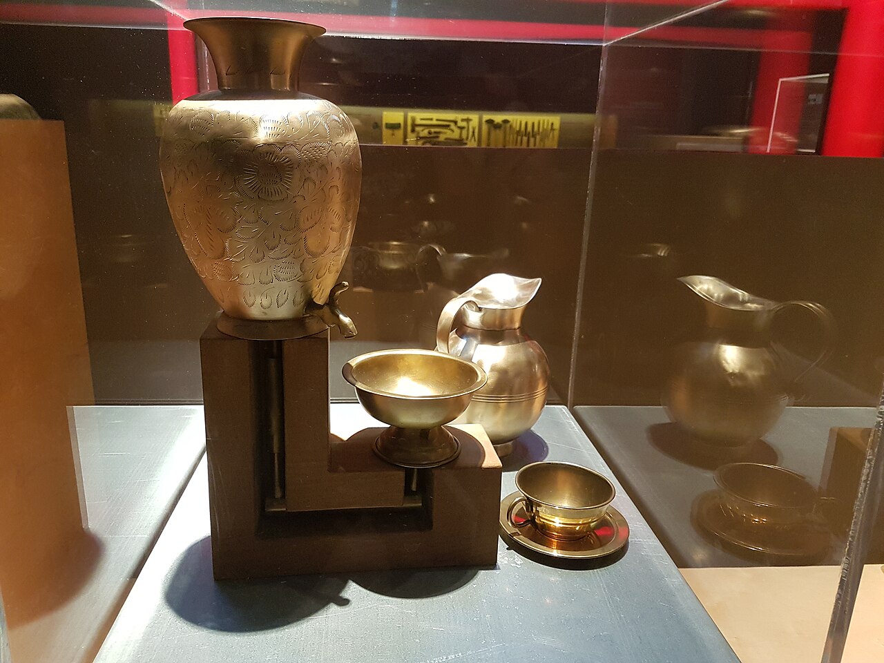 Modern reconstruction of Hero's coin-operated water dispenser