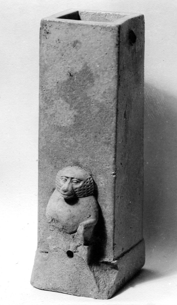 Ancient Egyptian model of a water clock with a squatting baboon